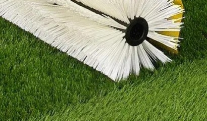 To clean artificial grass